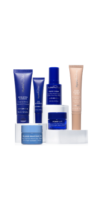 A dark blue puffy kit with 6 pieces of Hydropeptide travel sized products.